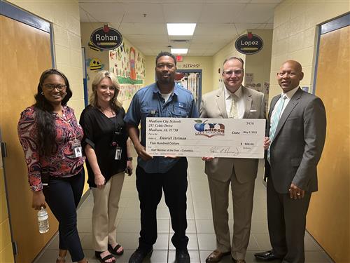 Columbia SMOTY Dauriel Holman with prize patrol